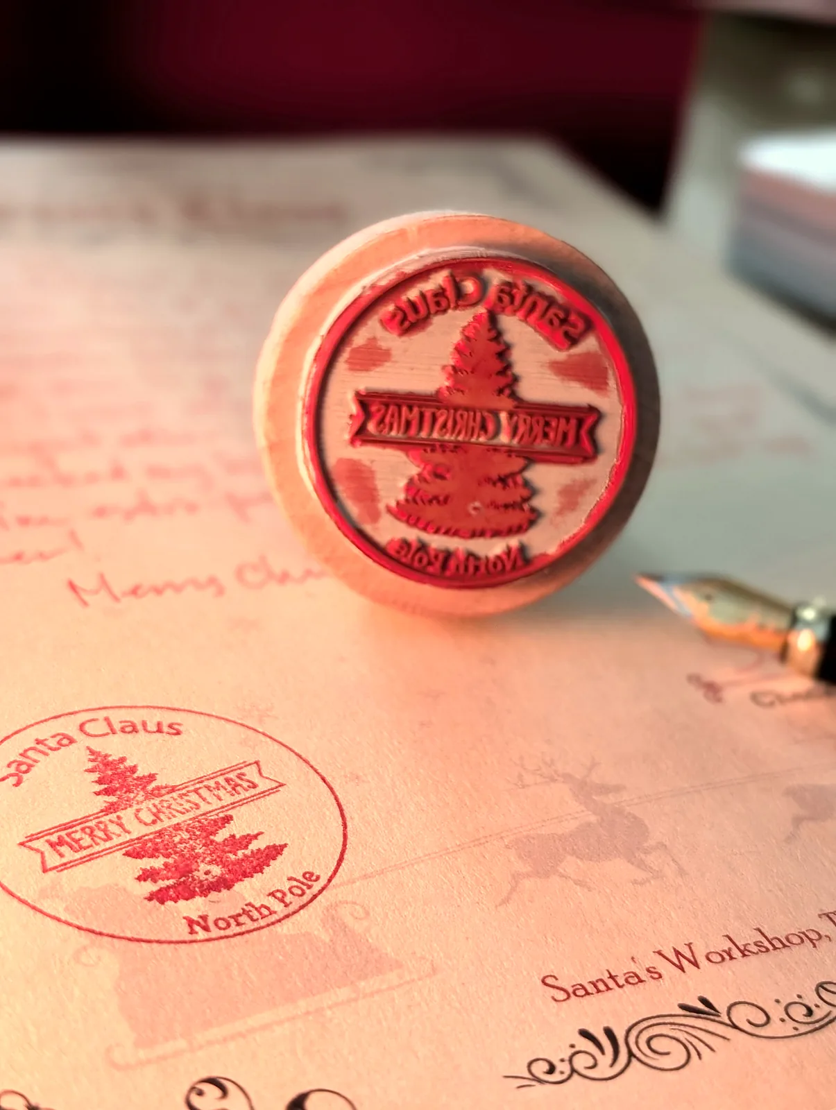 Santa's Merry Christmas North Pole rubber stamp on a handwritten letter